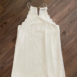 White scallop mini dress